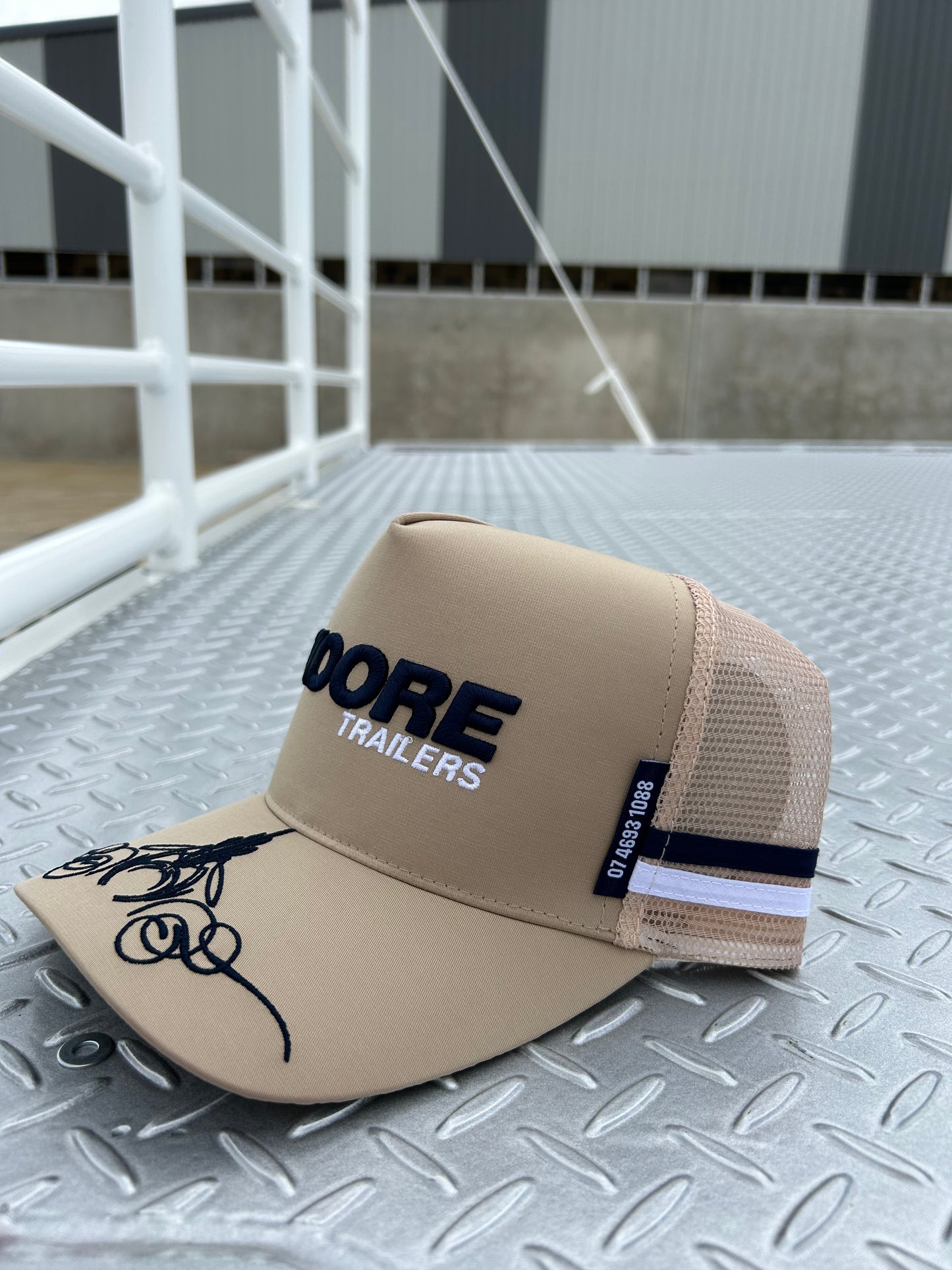 Tan Trucker Cap W/Scroll